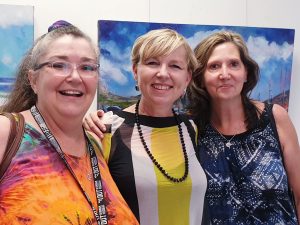 Group of friends with Arist Emma Jacobs at her Solo exhibition